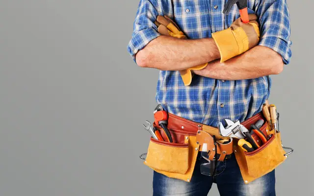 Handyman wearing a tool belt