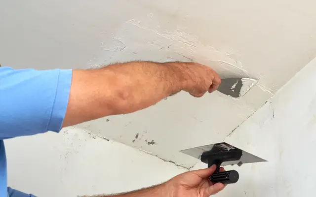 Patching and skimming a damaged ceiling