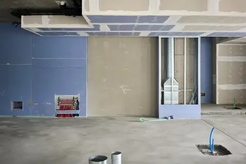 Office fit-out with new drywall partitions and ceiling bulkheads